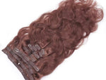 Extensiones de clip onduladas de pelo natural